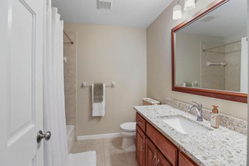 Large upper level full bath with storge space