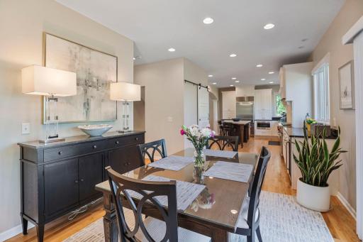 Barn door on the left opens up to a large, well organized pantry space