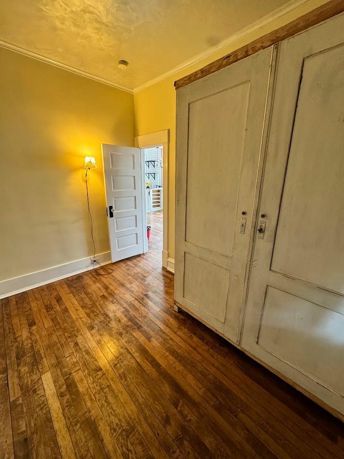 Main Floor Bedroom wood floors