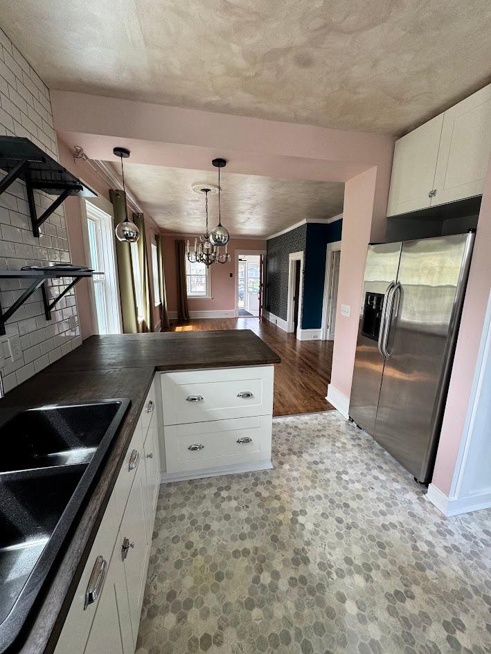 Kitchen view to living and dining room