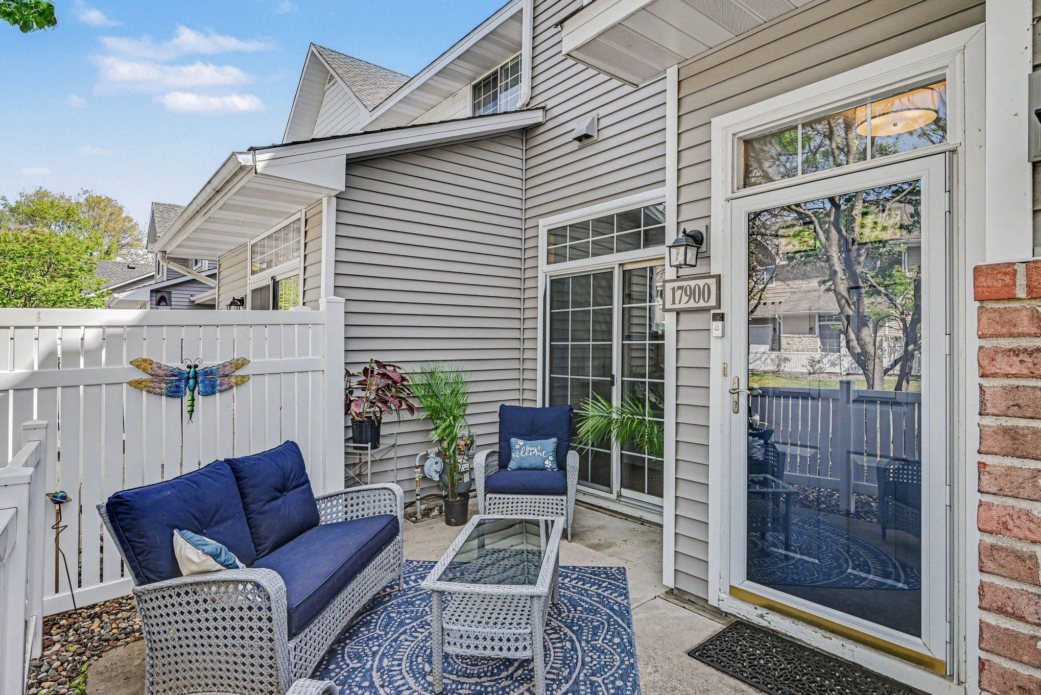 A serene private patio entry adds charm, privacy, and great curb appeal to this home.