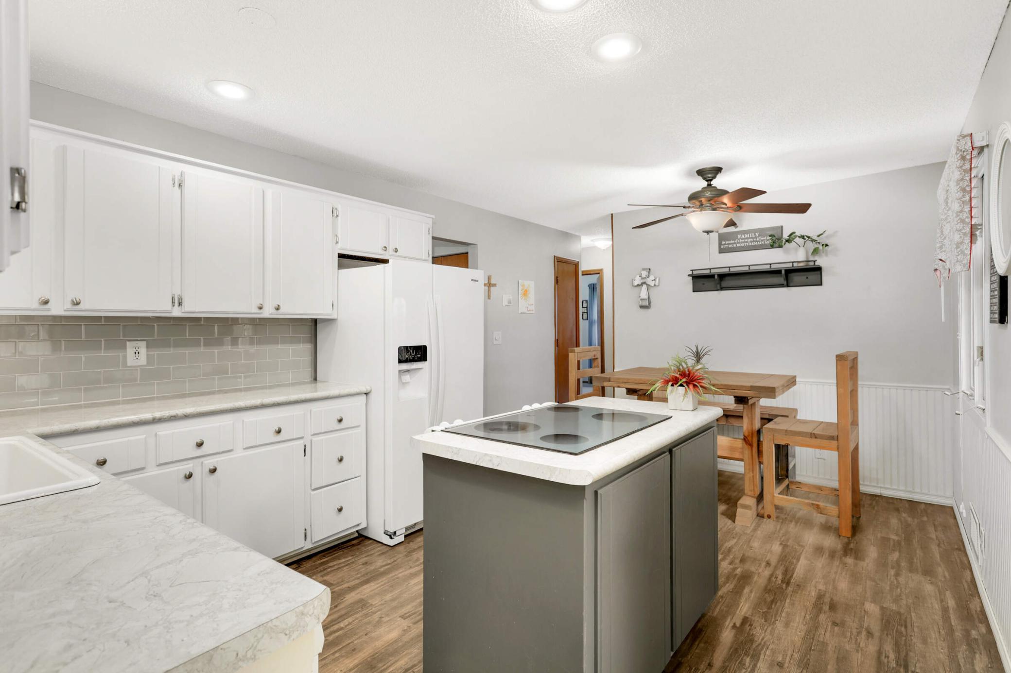 houghtfully updated kitchen with generous cabinet storage, quality finishes, and excellent workspace for cooking and entertaining.
