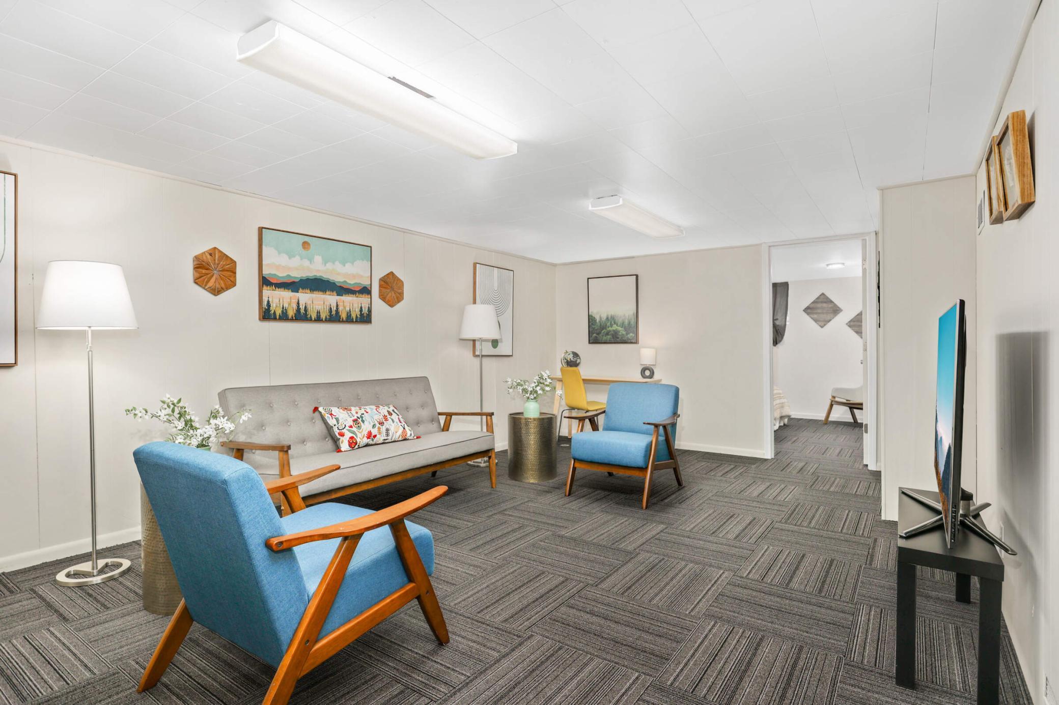 Lower-level living space offers endless possibilities for recreation, movie nights, fitness, or entertaining.