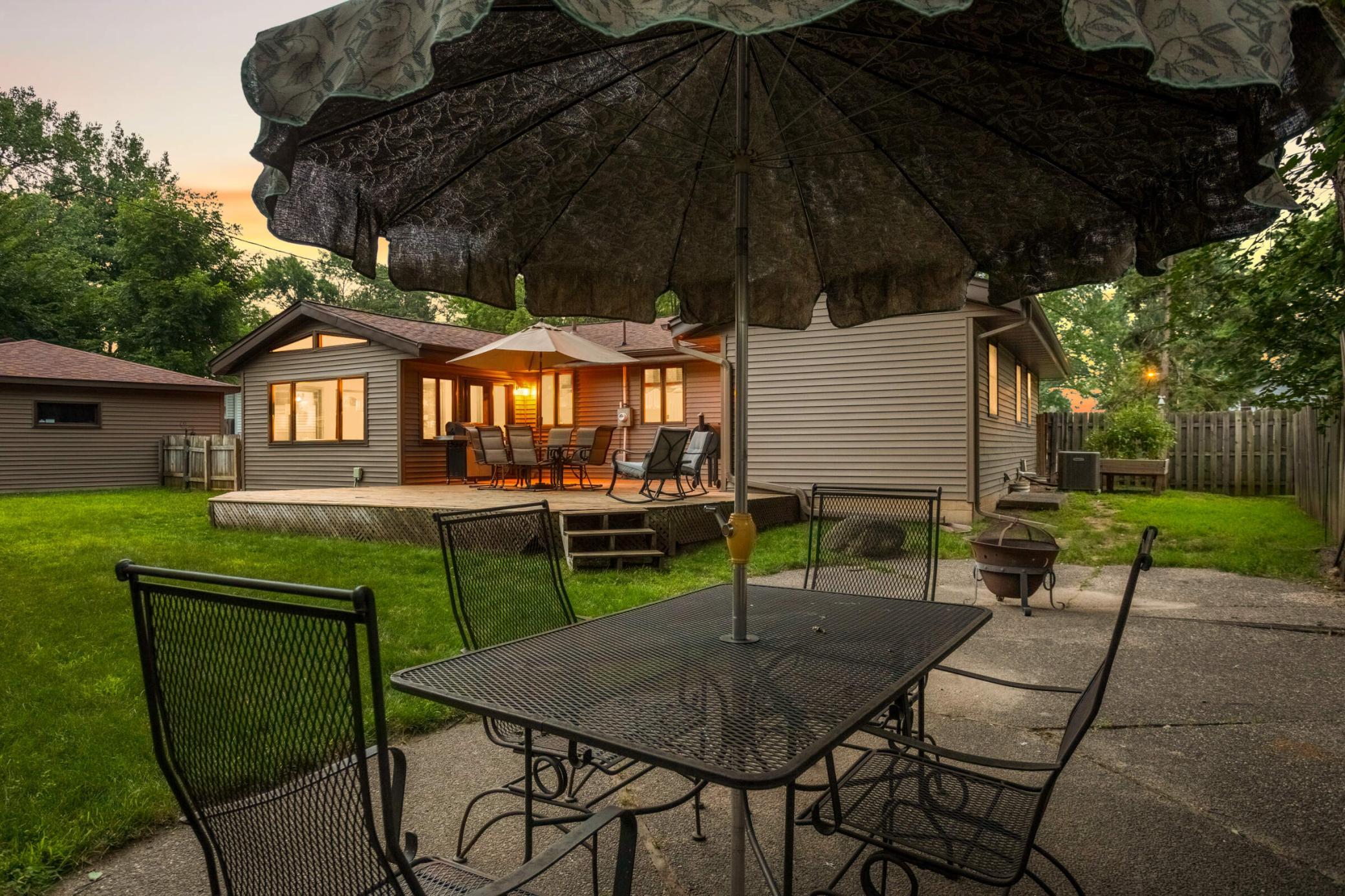 Expansive backyard provides privacy, mature trees, and plenty of room for outdoor activities, gardening, or future entertaining spaces.