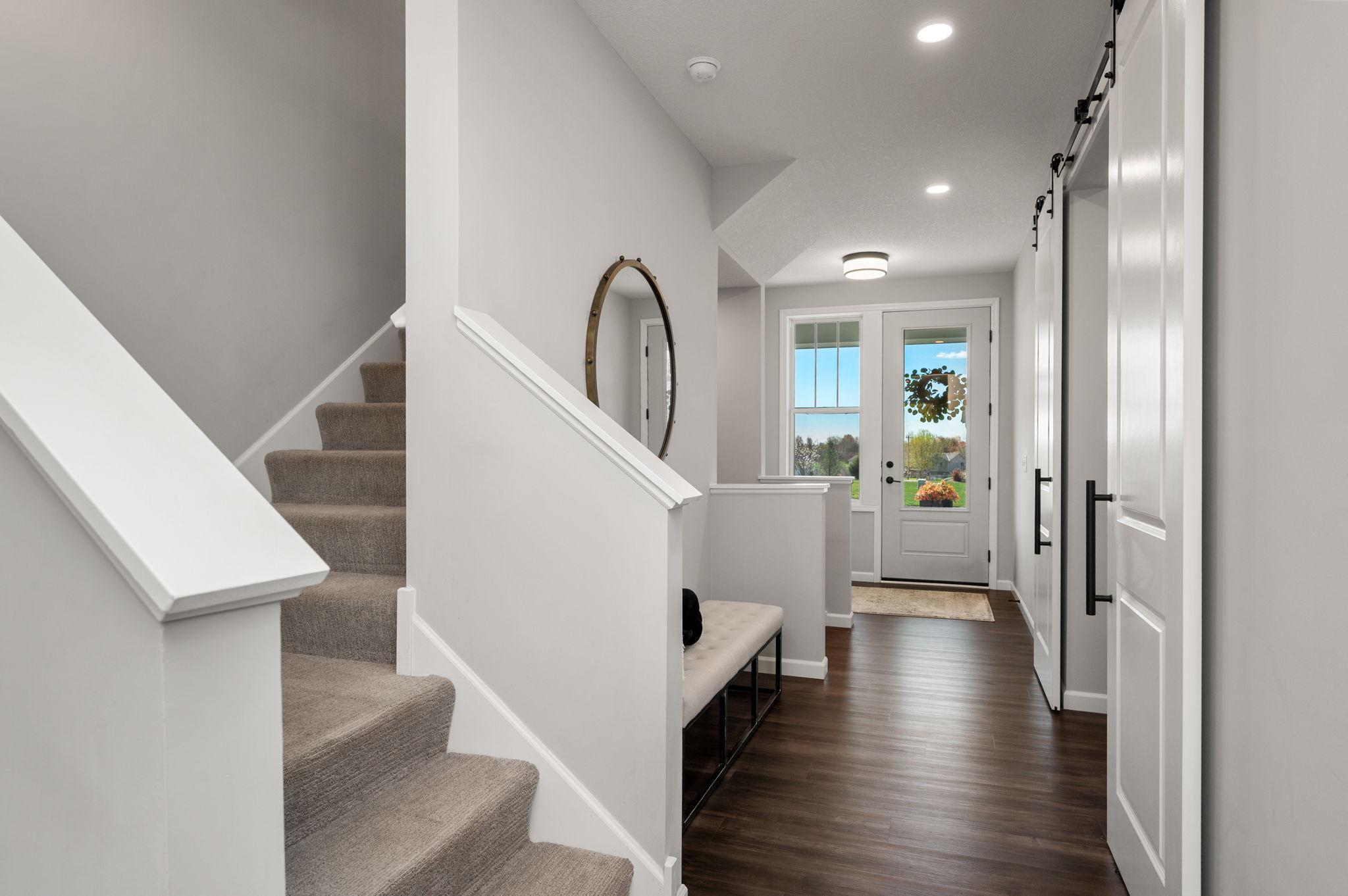 Nice open foyer with open staircase