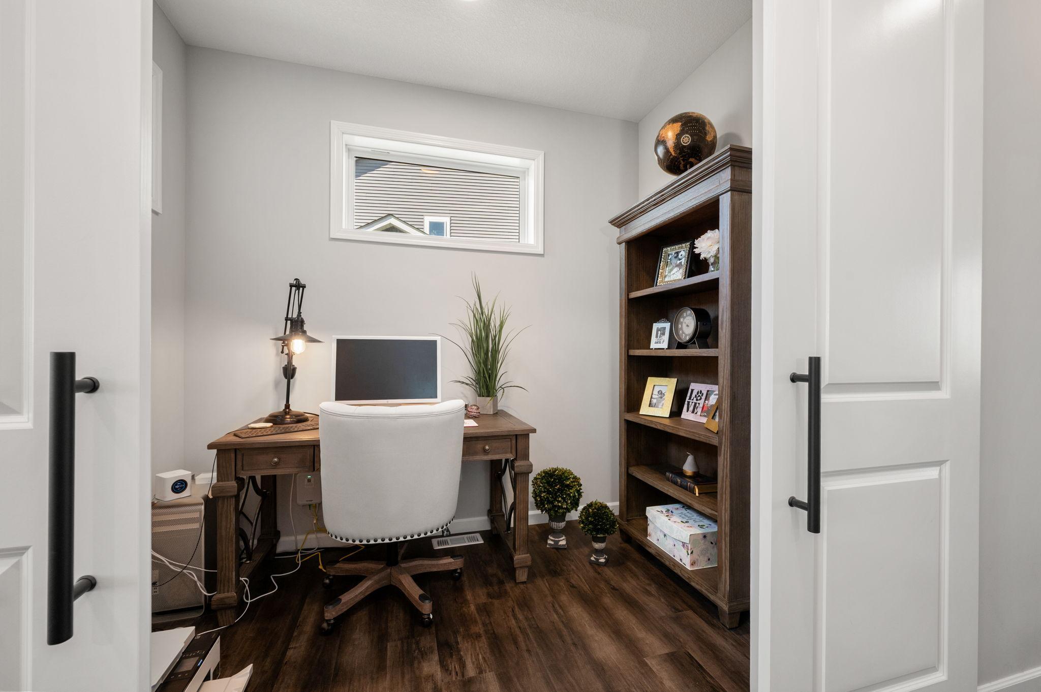 Stylish barn doors on the main-floor office!