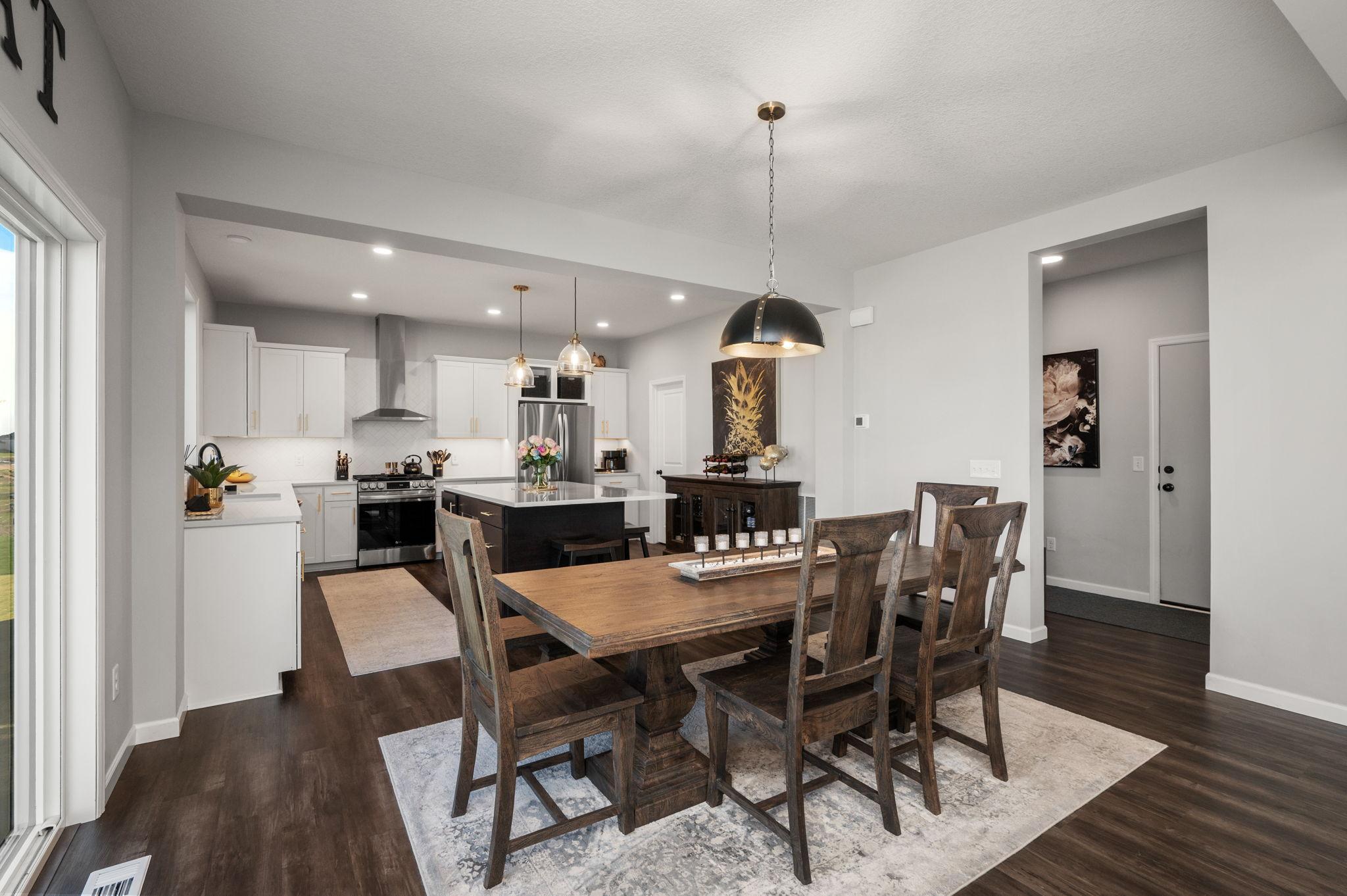 Dining Room open to Kitchen with massive center island and storage