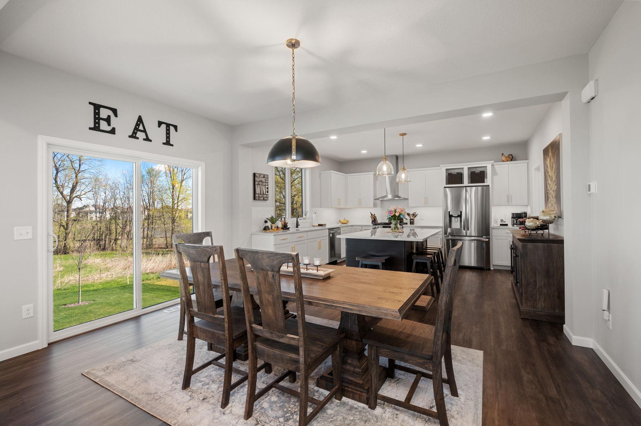 Dining Room open to Kitchen with massive center island and storage