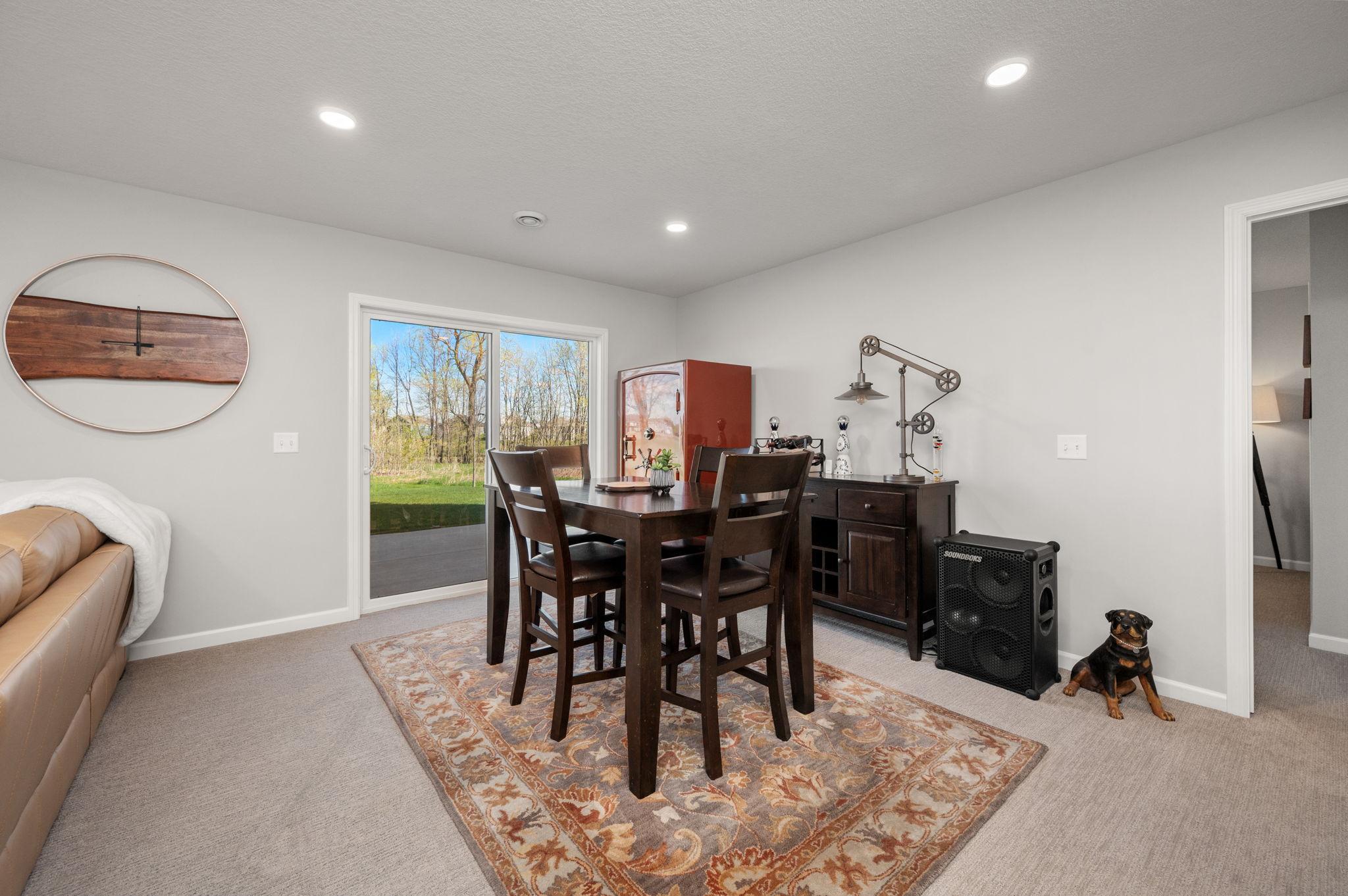 Walkout lower level game room area off family room