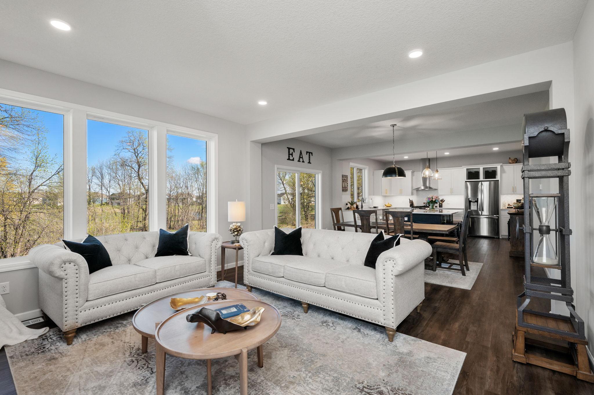 The main floor Living Room is open to Dining Room and Kitchen!