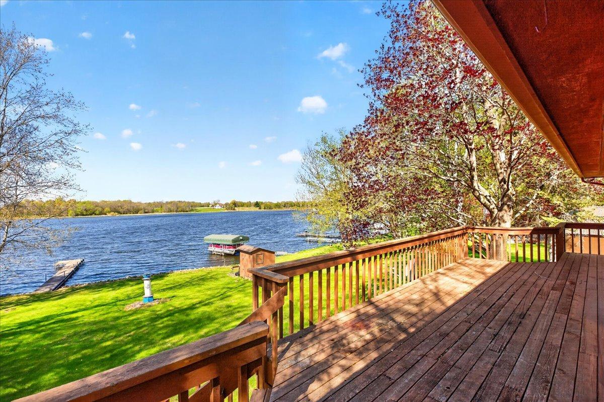 Expansive lakeside deck offers incredible views and the perfect space for entertaining or relaxing outdoors.
