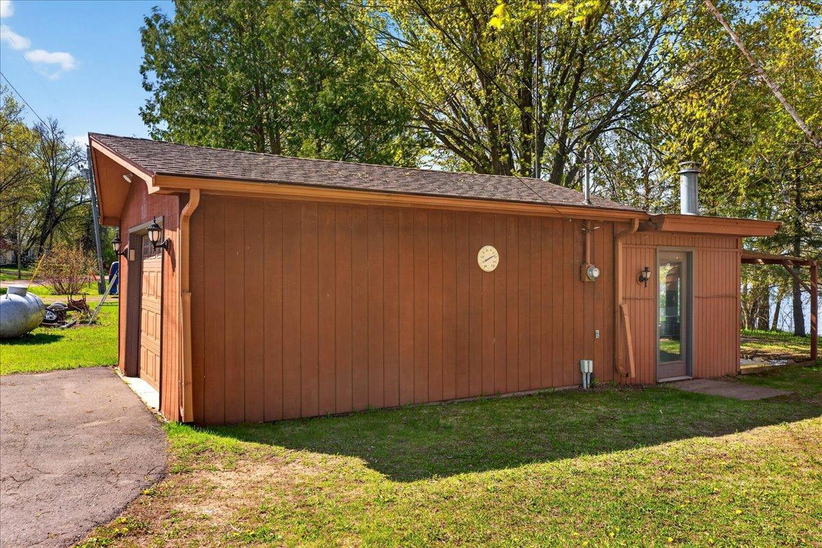 Nicely maintained garage with convenient access and additional storage potential.