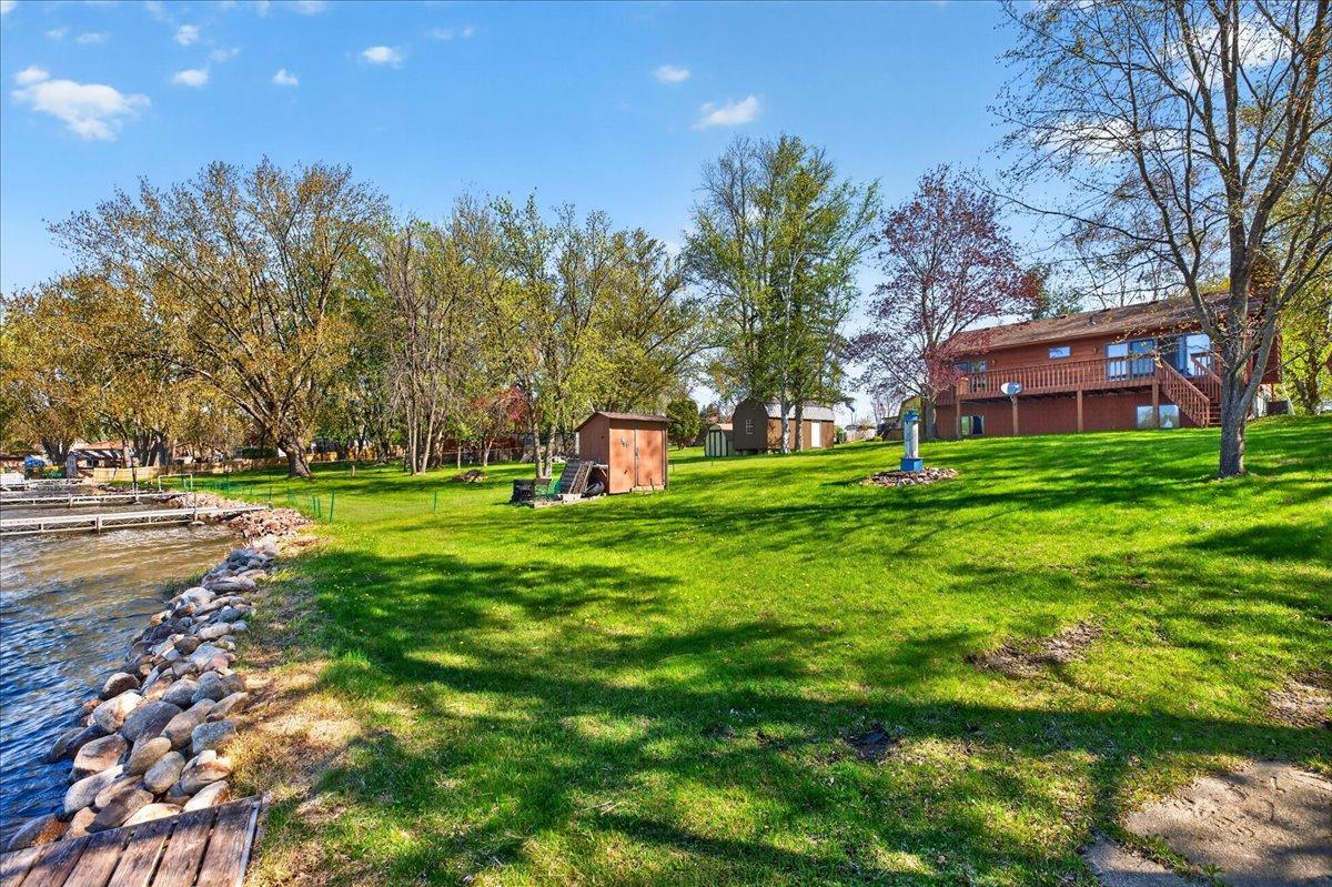 Beautiful shoreline setting with gradual access to the water and scenic lake views.