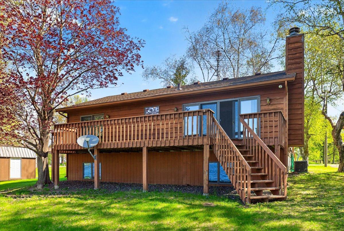 Expansive lakeside deck offering the perfect space to relax, entertain, and enjoy the water views.