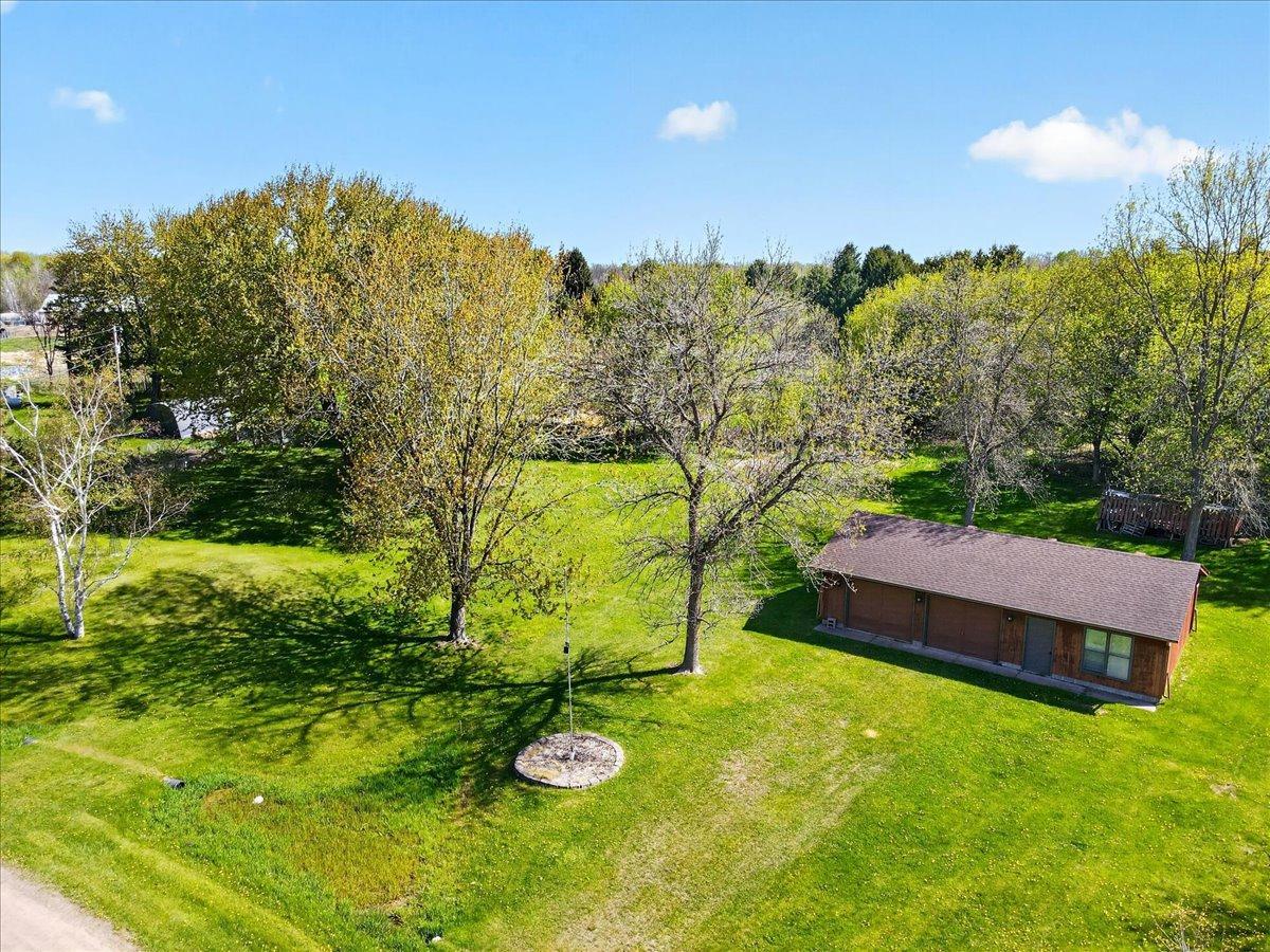 Large detached 3-car garage (approximately 40x24) provides outstanding space for vehicles, lake toys, hobbies, or workshop use.