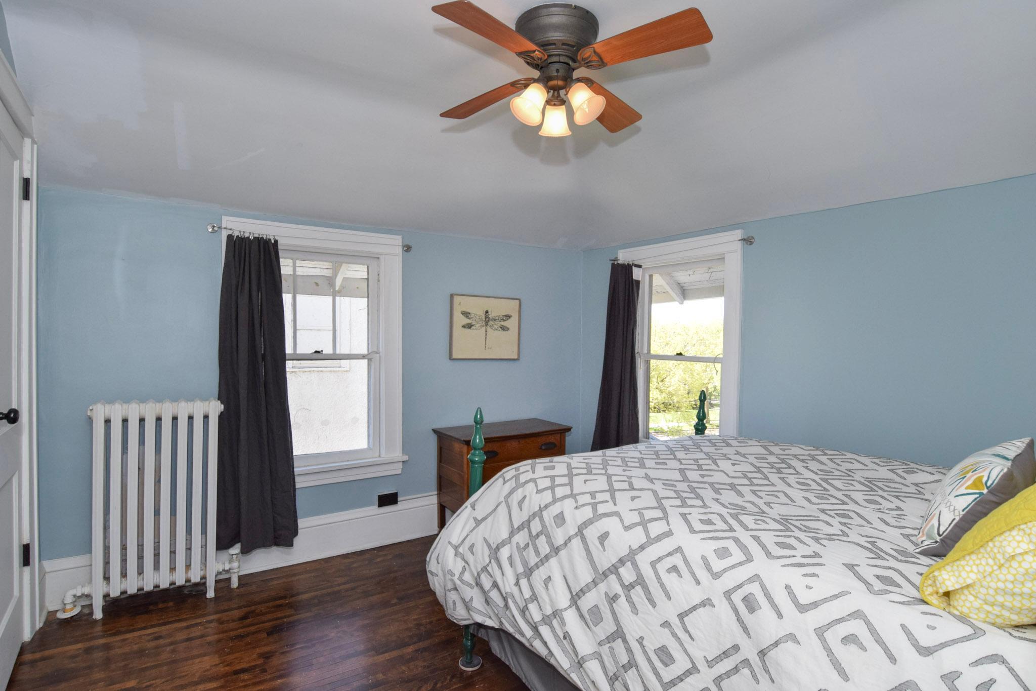 Bedroom #2 on upper level- hardwoods here as well!