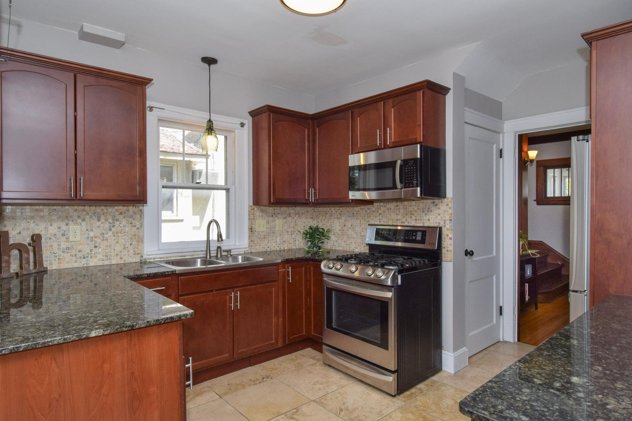 Great flow to the main floor!-Kitchen is accessed from both the dining room & living room.