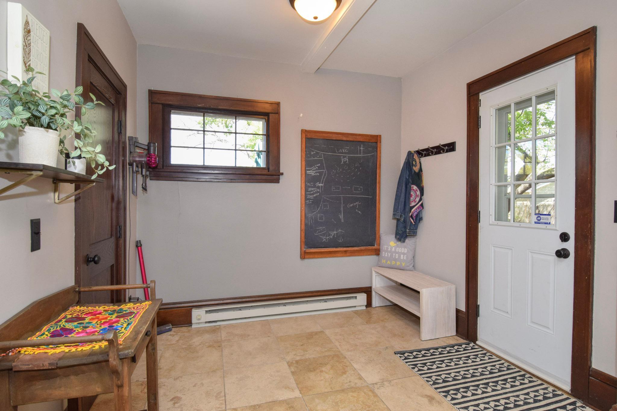 Mudroom area, door on the right is to back yard-door on the left is to the main floor powder room.