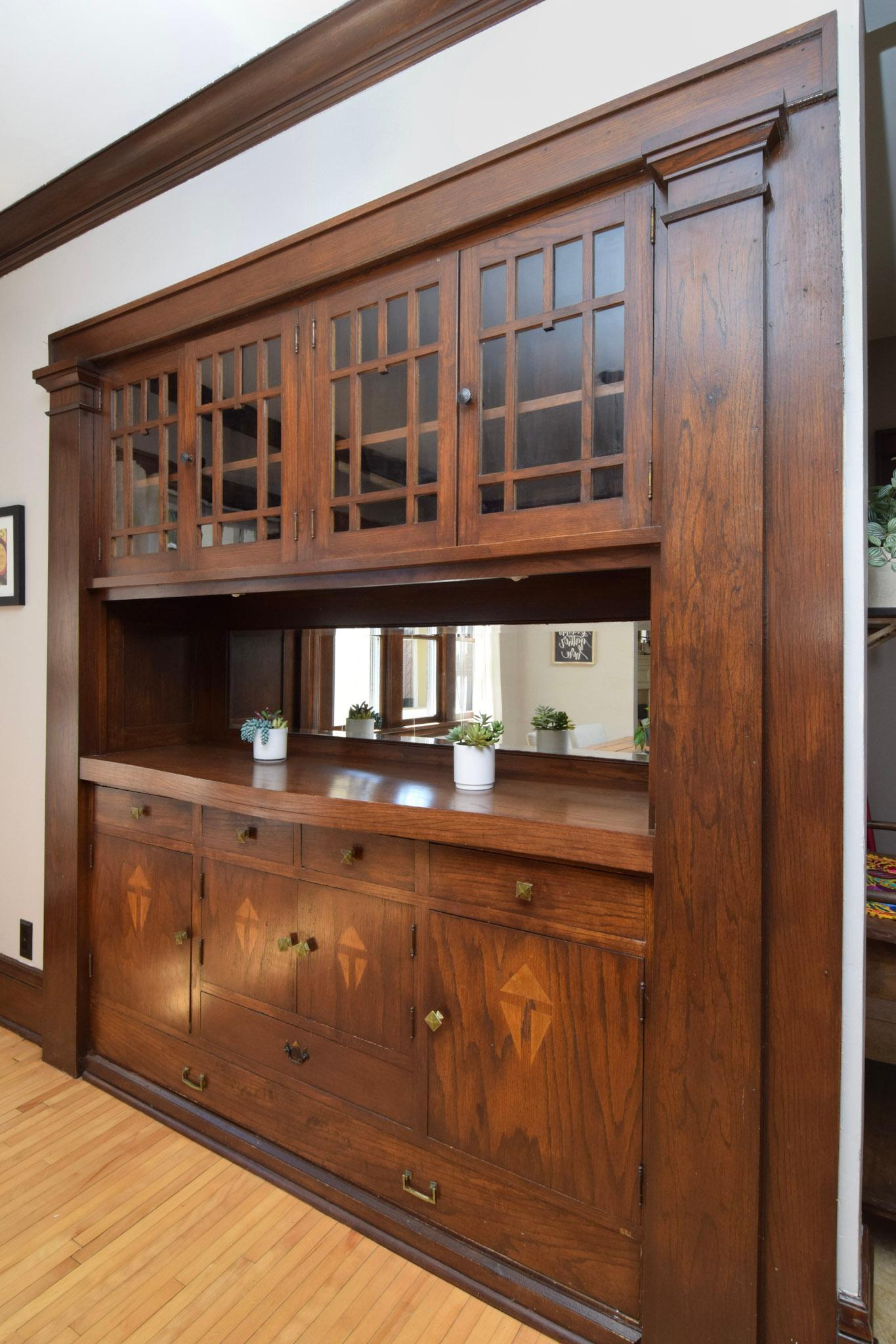 Adding warmth & functionality, the built-in buffet serves as a centerpiece of the home.