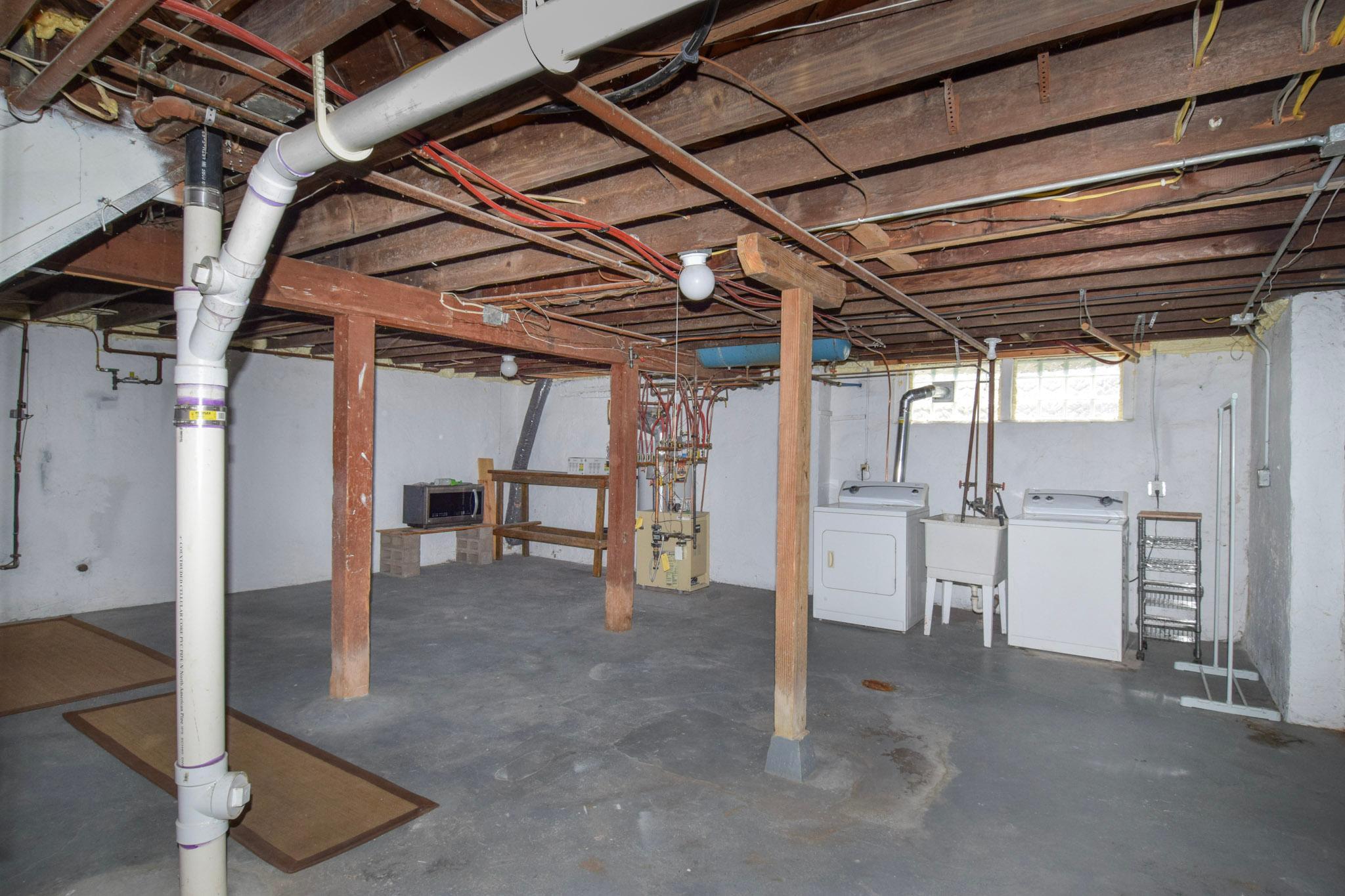 Ample storage space in the basement--clean with ample ceiling height.