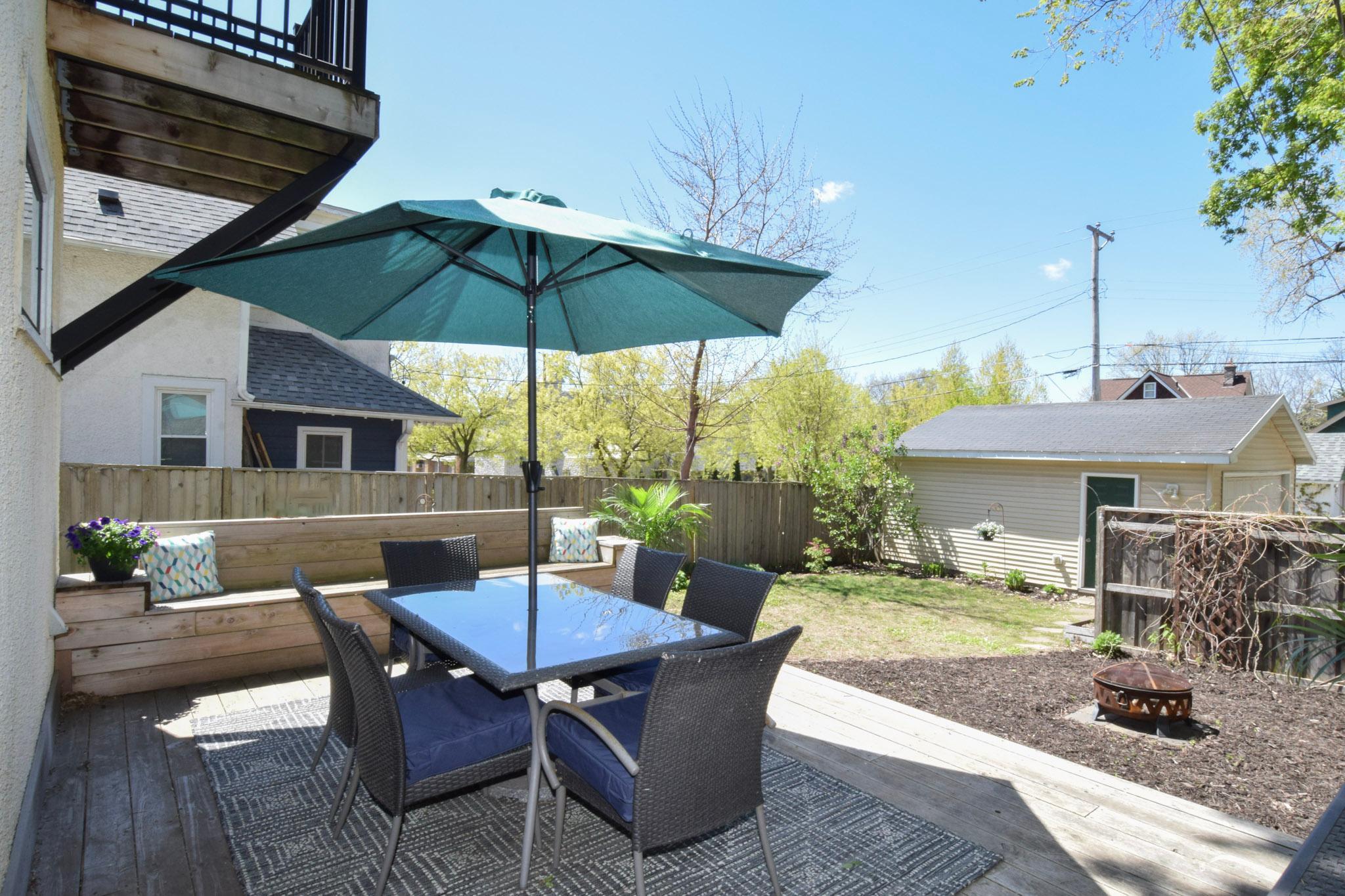 The deck fits a large table & has built-in seating