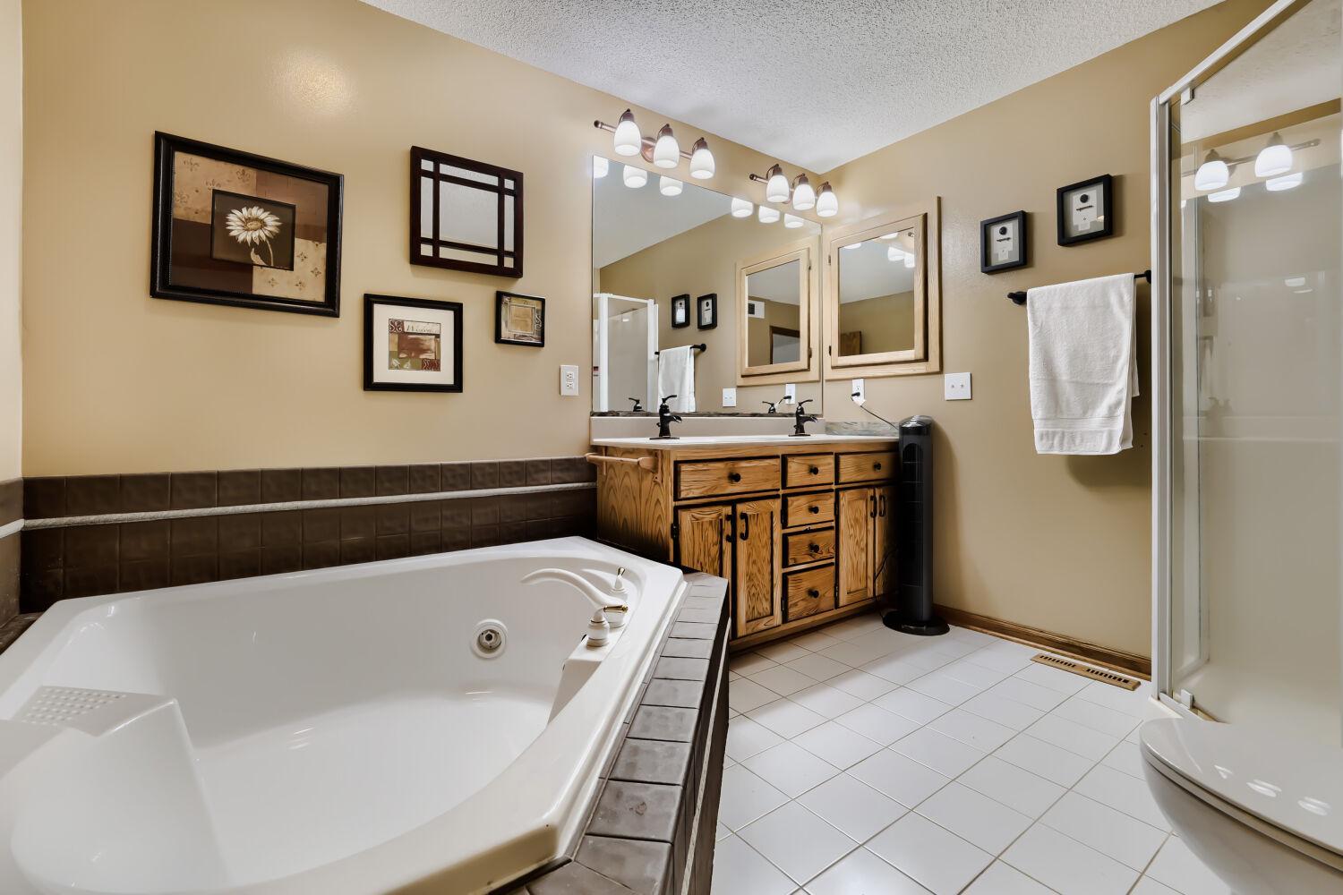 13834 Washington St NE - Web Quality - 023 - 18 Primary Bathroom.jpg
