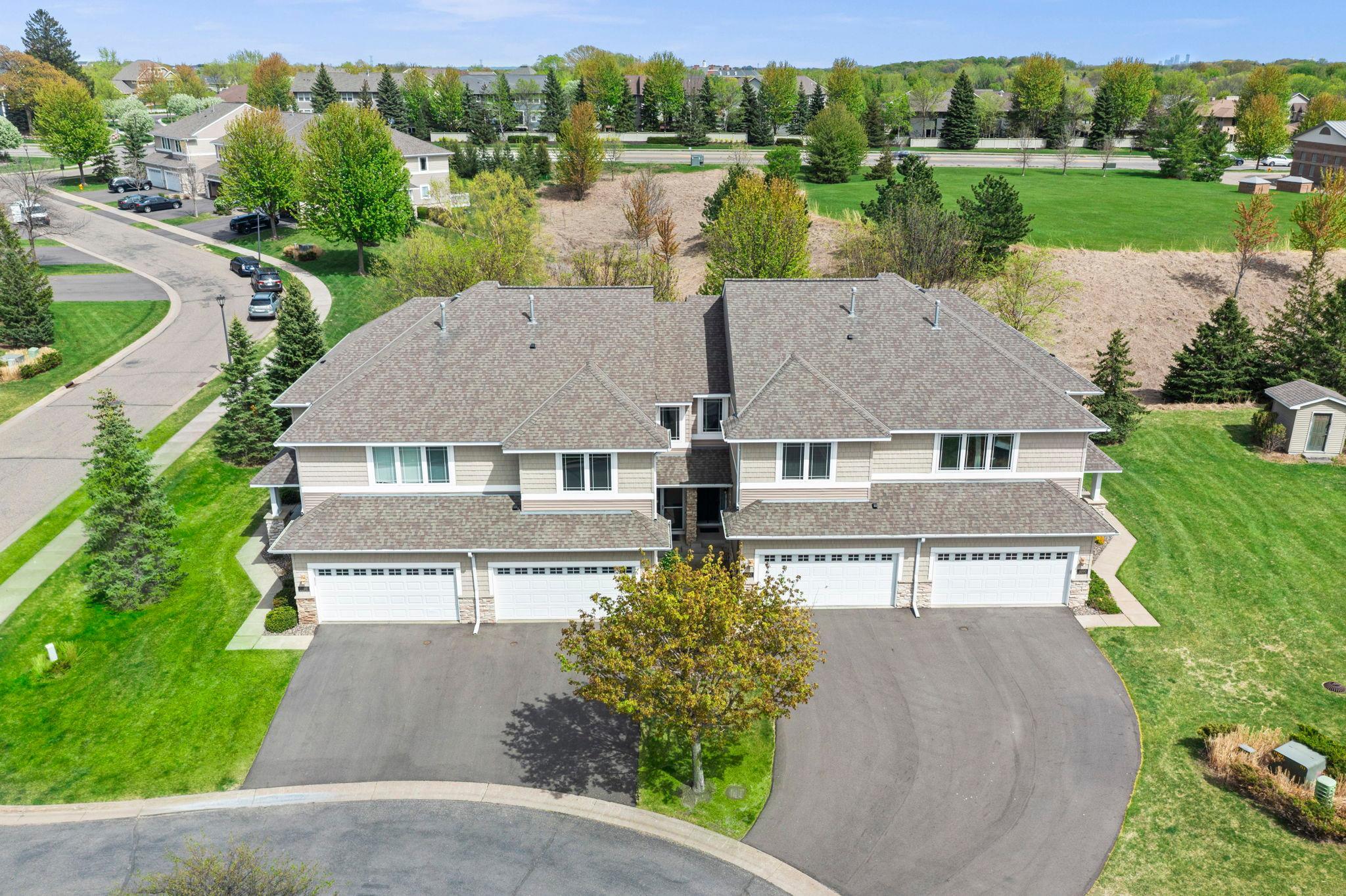 Aerial view of the cul-de-sac location, showcasing the private entry and manicured green spaces.