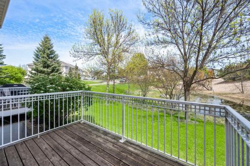 This tranquil outdoor space offers a peaceful retreat with mature trees and professional landscaping.