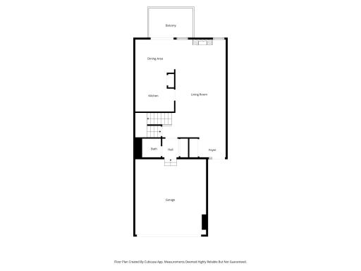 Simplified 2nd-floor diagram emphasizing the open living area and outdoor balcony access.