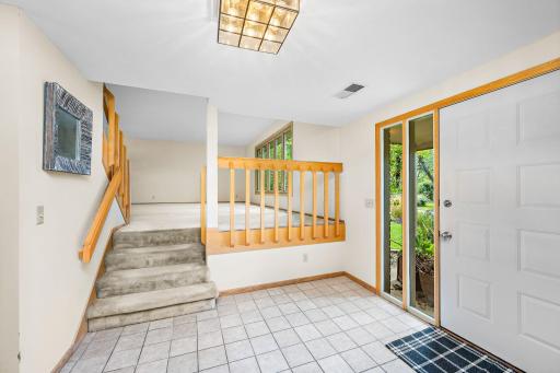 Front foyer. Wide open & tiled!