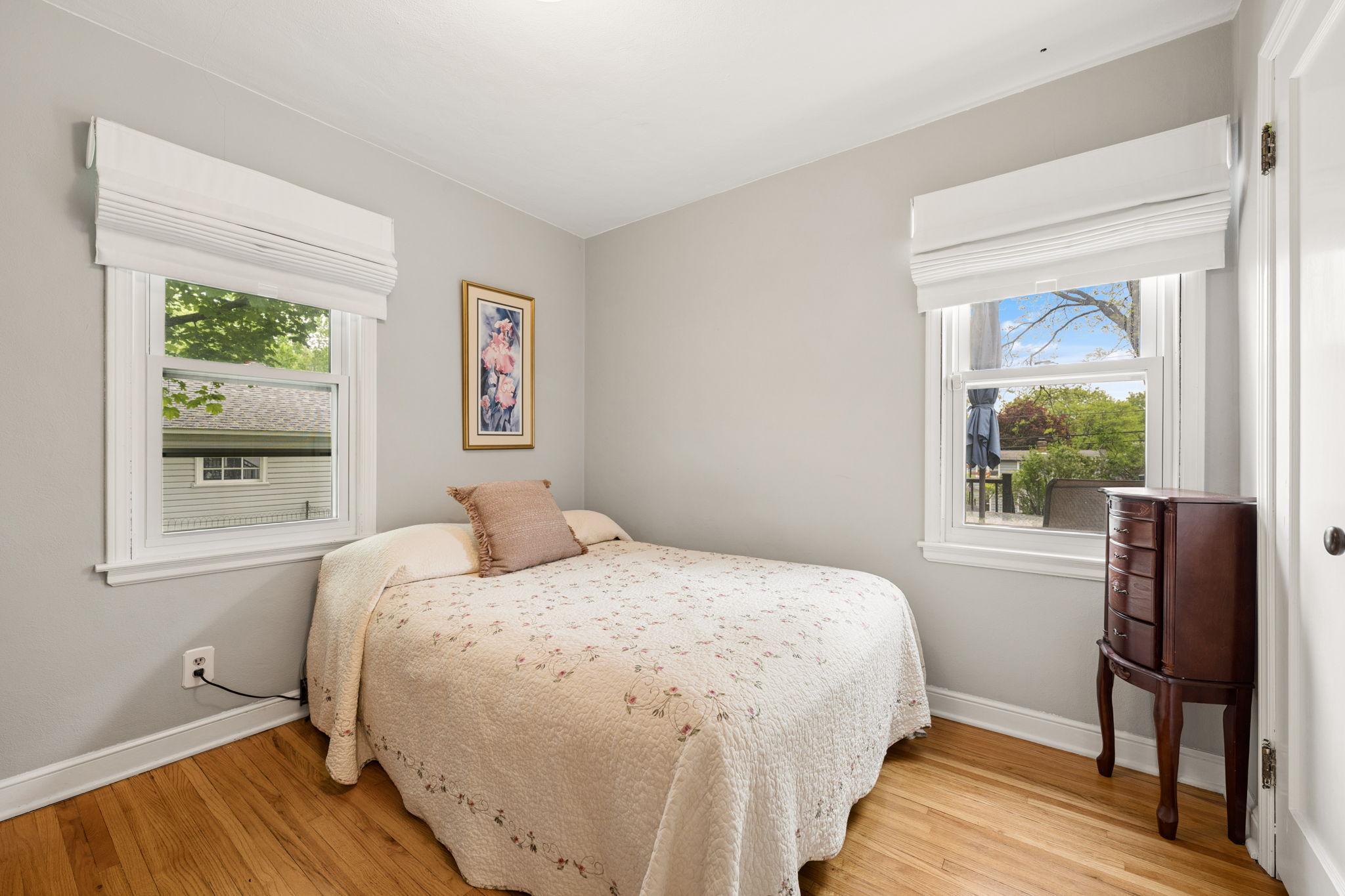 Two bedrooms and a full bathroom complete the main level.