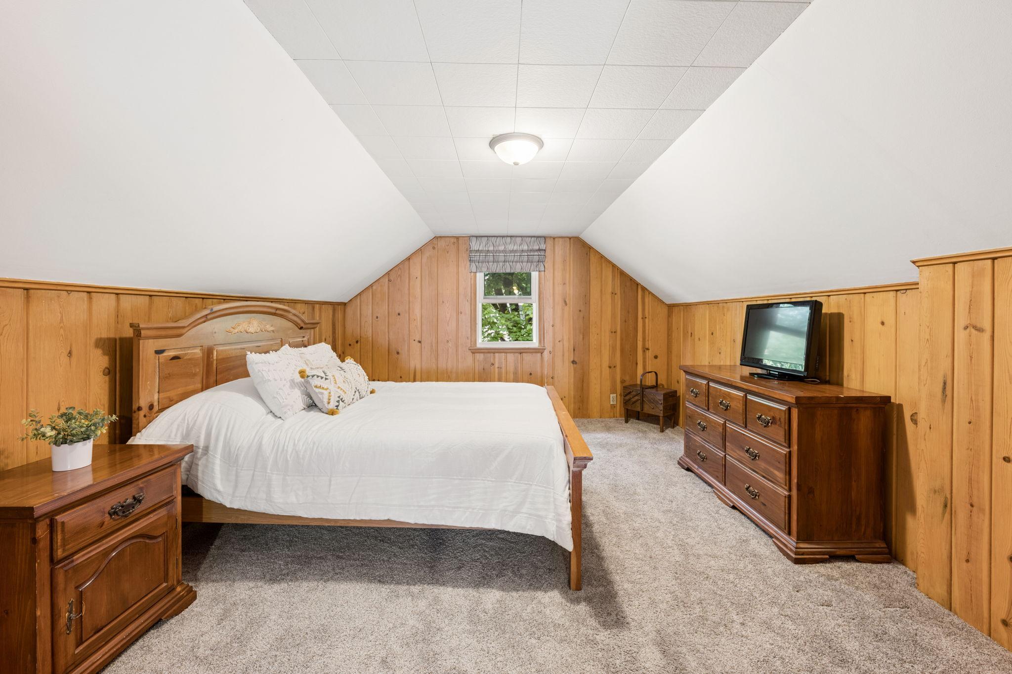 Relax in your primary bedroom retreat on the upper level.