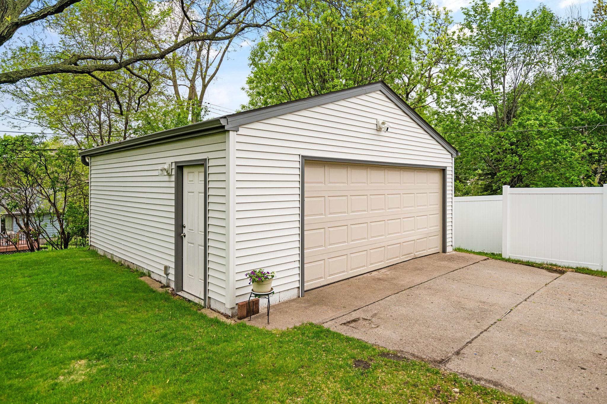 Newer detached garage with epoxy floor and plenty of room for additional storage.