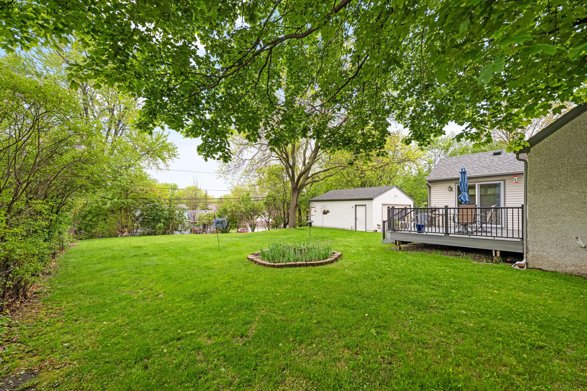 Stunning lot surrounded by mature trees & beautifully maintained landscaping.