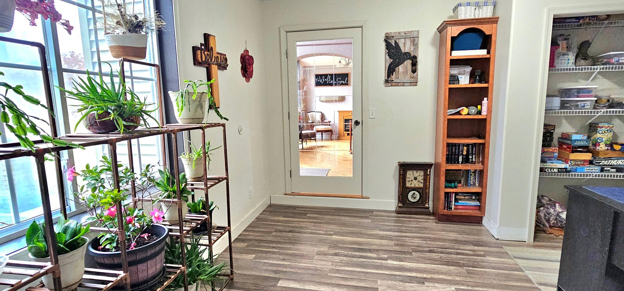 Main floor home office/bedroom *NEW FLOORING