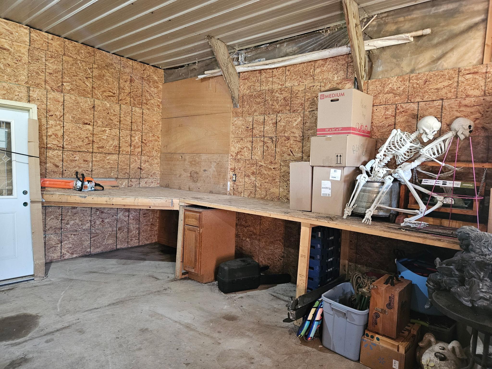 30x42' insulated shop, concrete flr, 100 amp panel, w/ wood stove