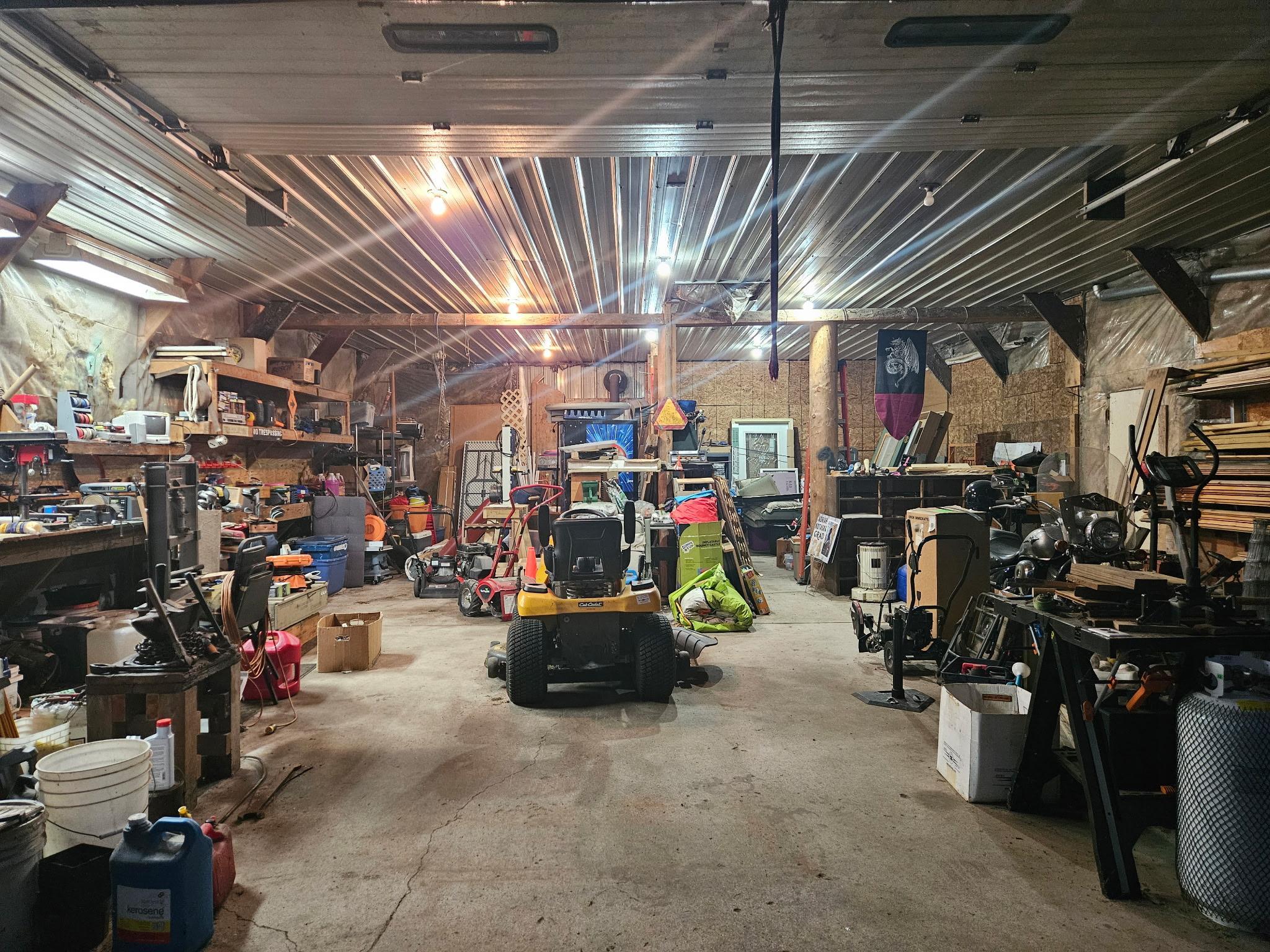 30x42' insulated shop, concrete flr, 100 amp panel, w/ wood stove