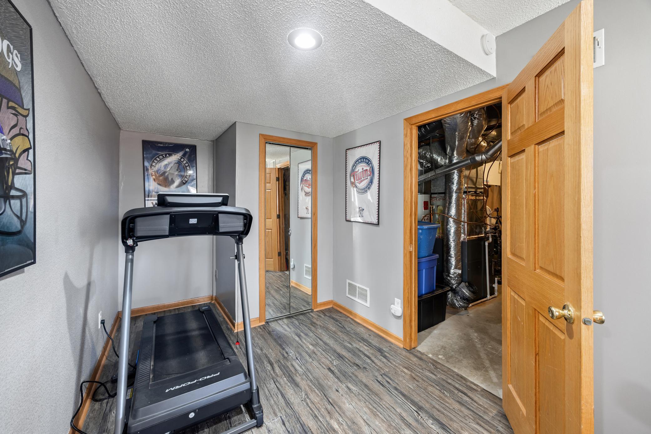 Amble storage space and room in this lower level exercise room