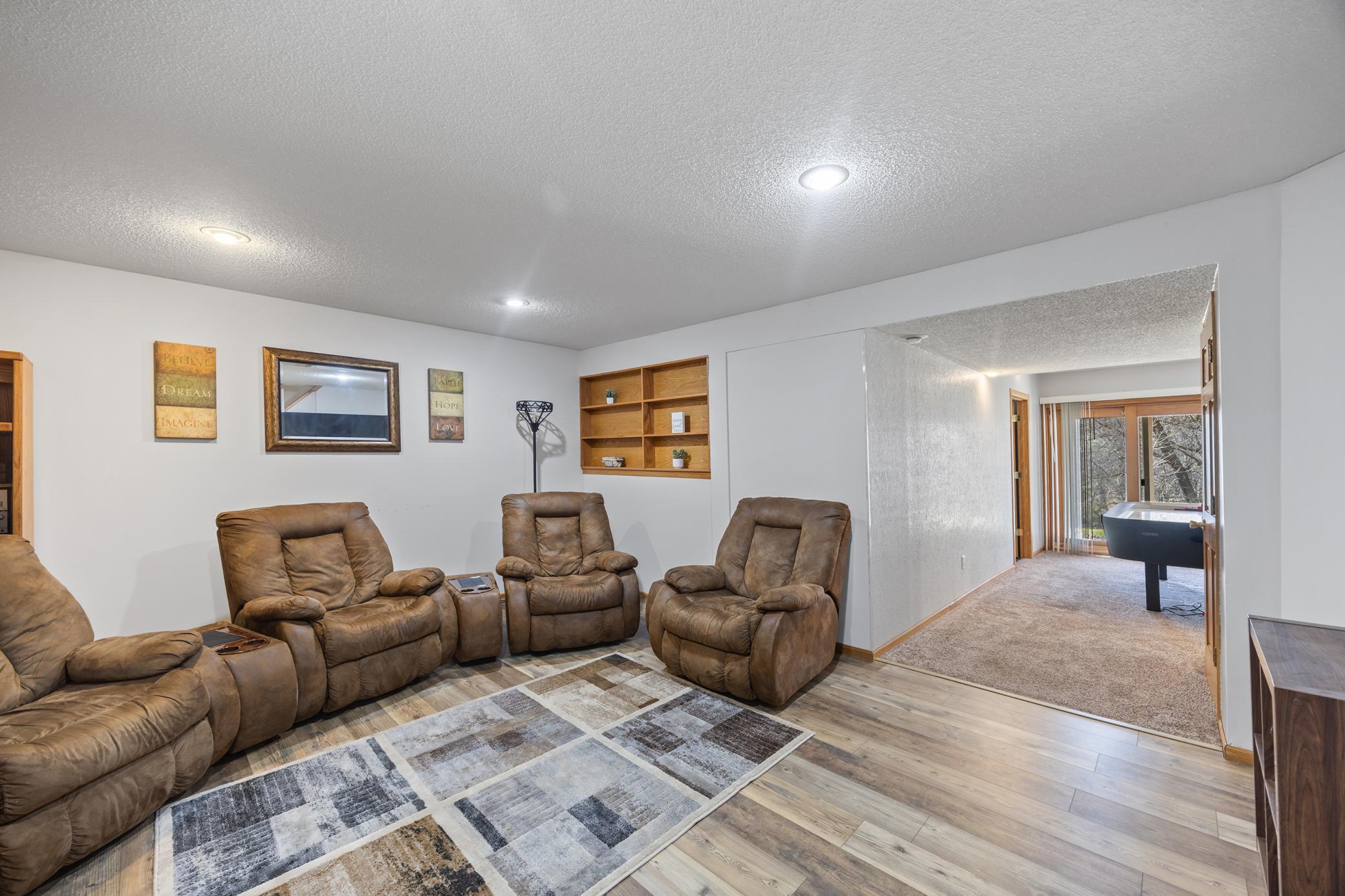 Lower level family room with space to entertain