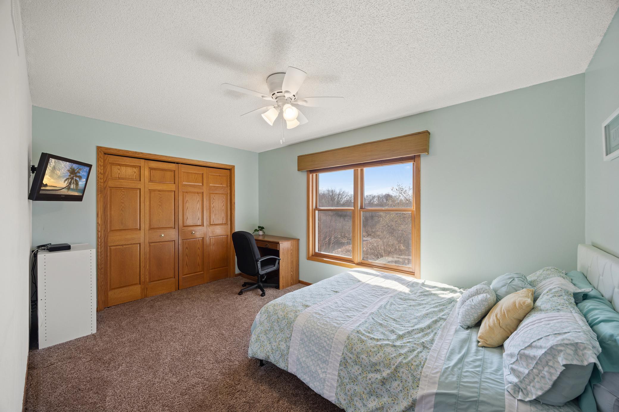 Upper level 2nd bedroom with a large closet
