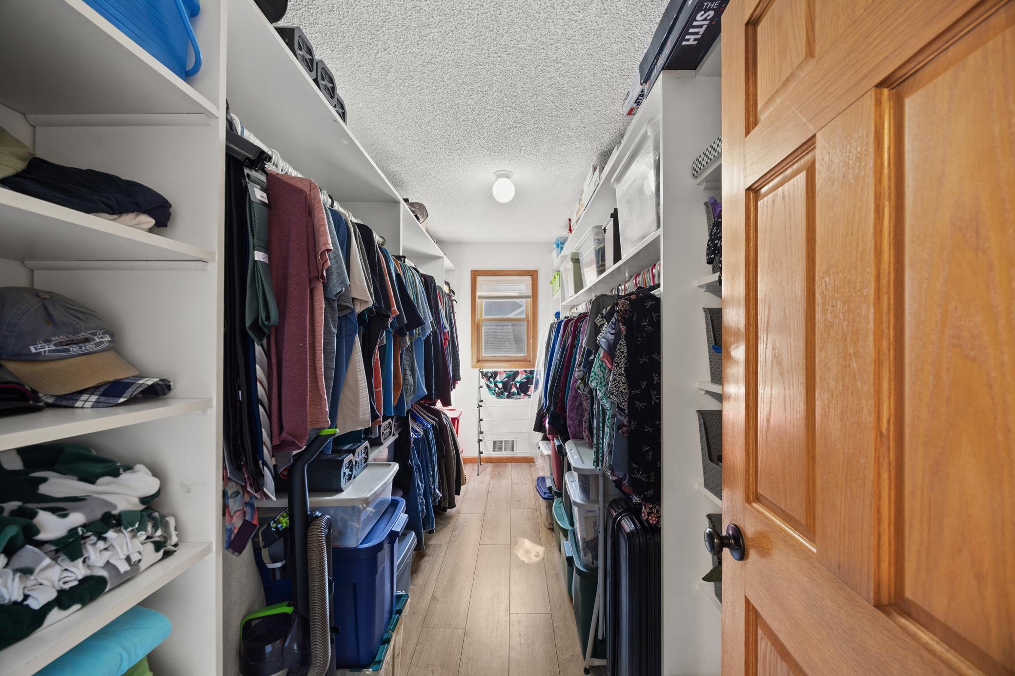 Expansive primary walk-in closet