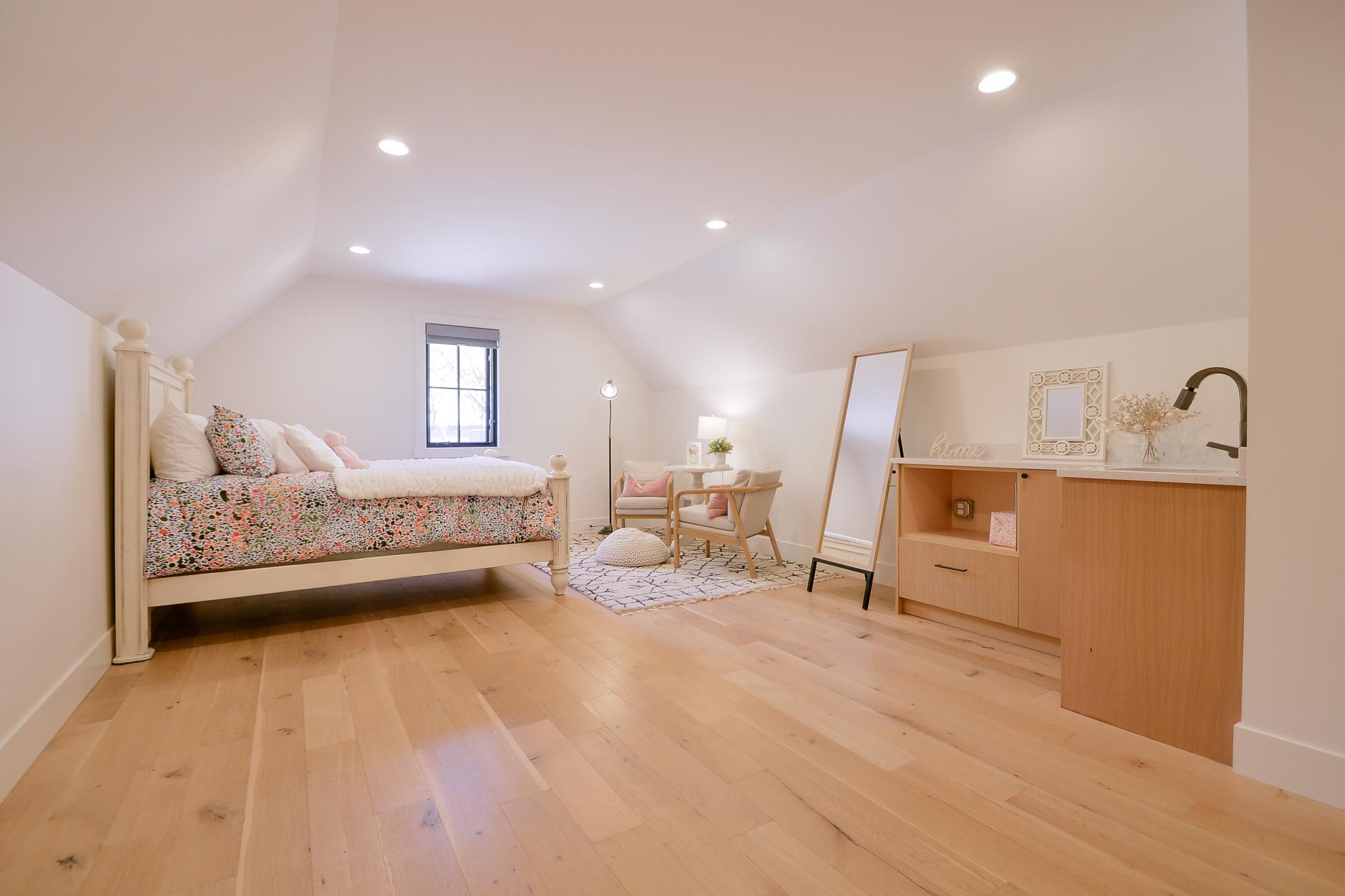 Upper level bedroom with wet bar, 3/4 bathroom and abundant storage