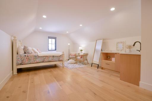 Upper level bedroom with wet bar, 3/4 bathroom and abundant storage