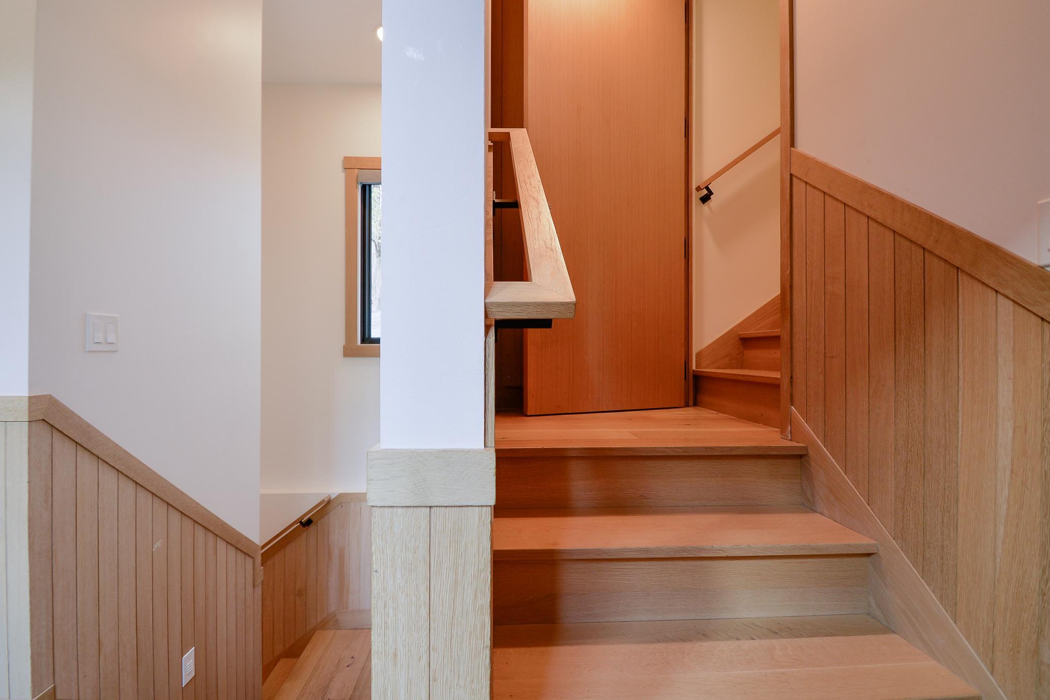 Stairs leading to upper bedroom