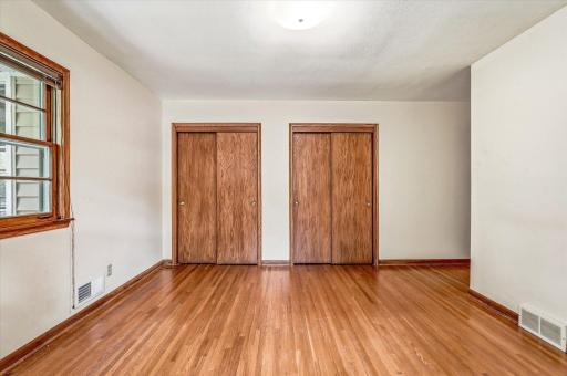 The main bedroom 1 also features dual closets.