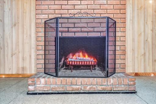 It also features a brick, wood burning fireplace. - *flames added via photoshop*
