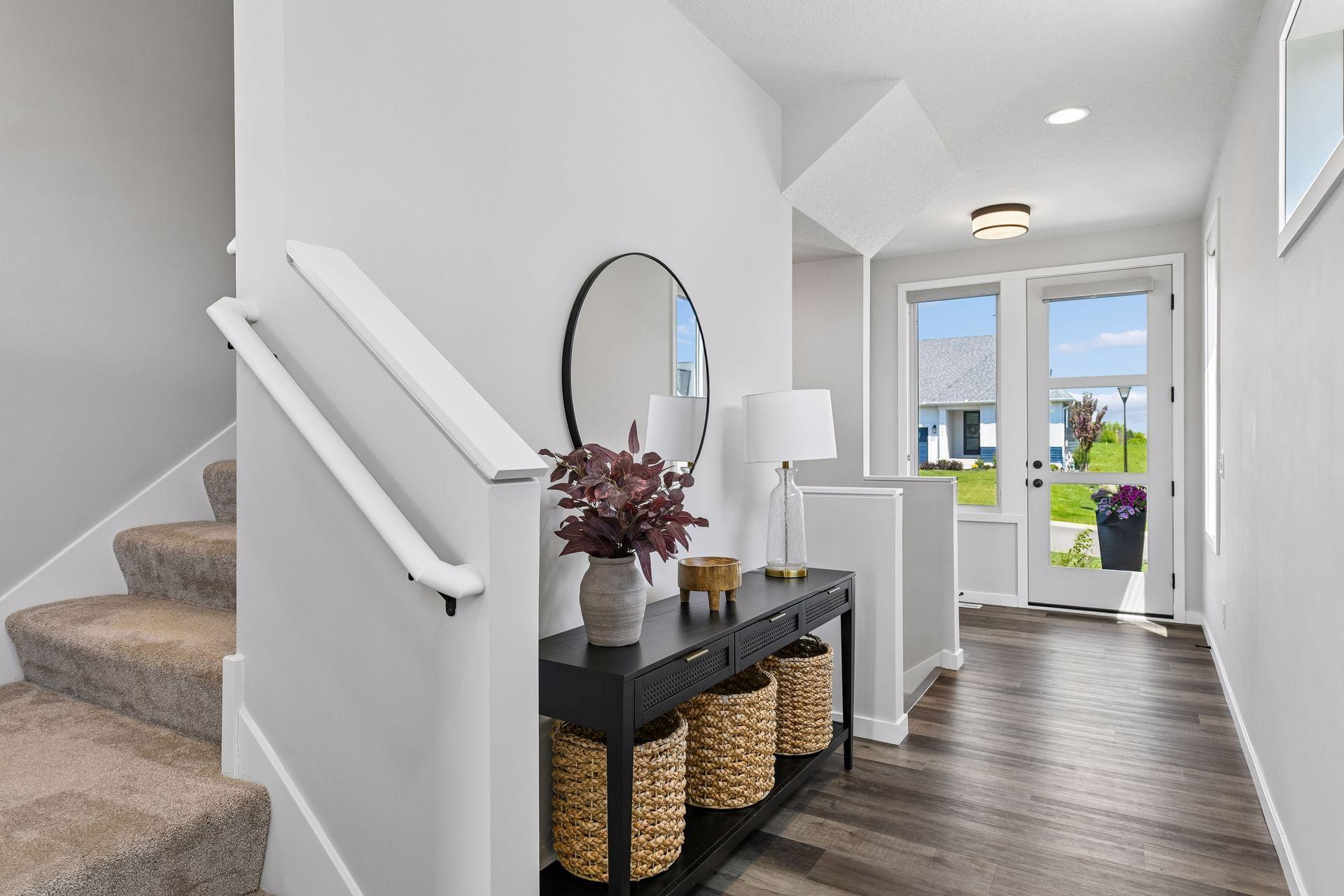 A bright, welcoming entry sets the tone with clean lines, fresh finishes, and a polished first impression.