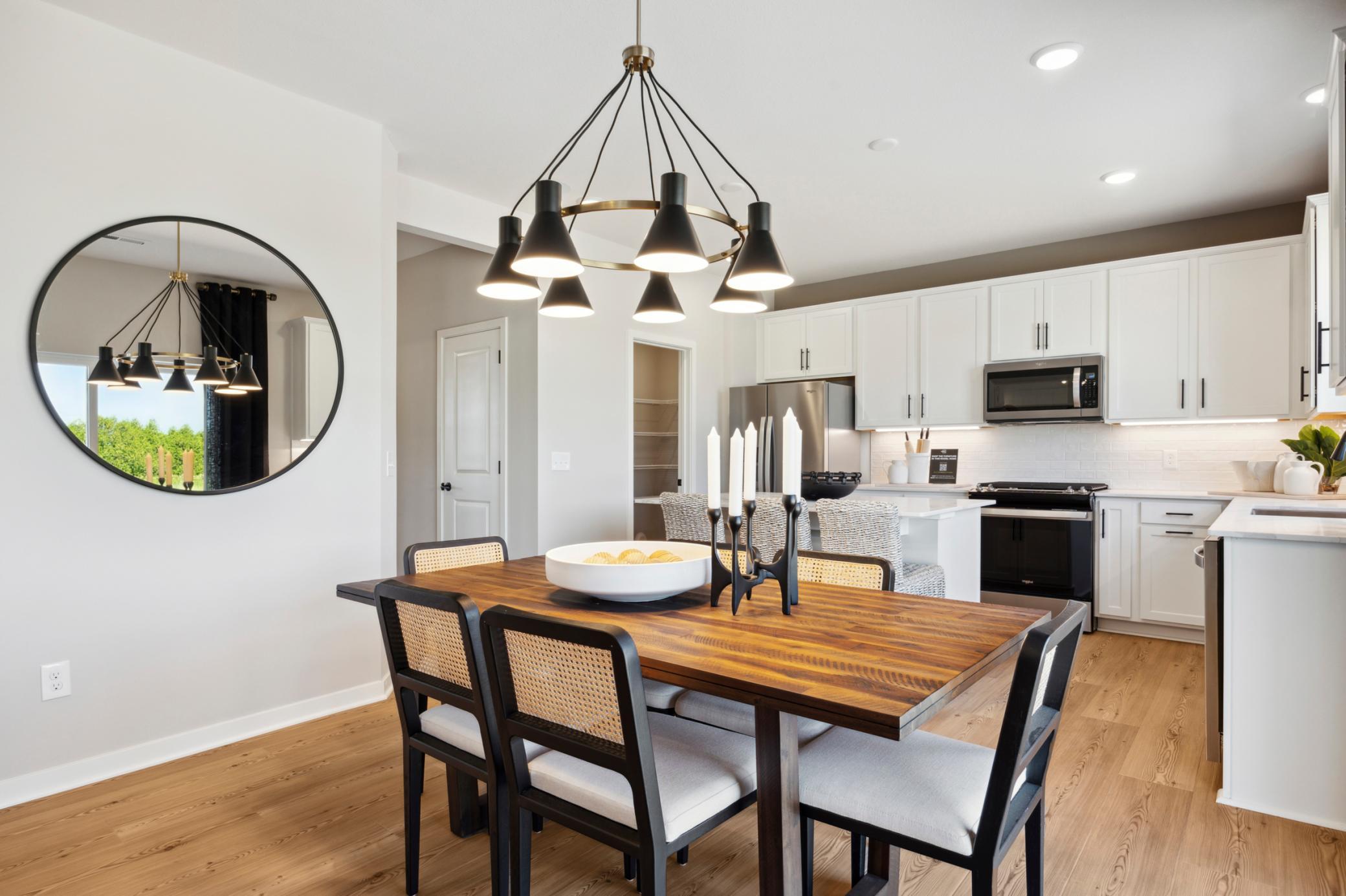 Kitchen. Photo is of a similar Lowry model home.