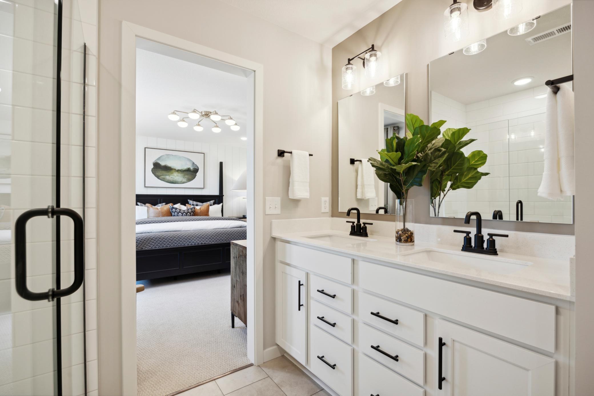 Primary Bathroom. Photo is of a similar Lowry model home.