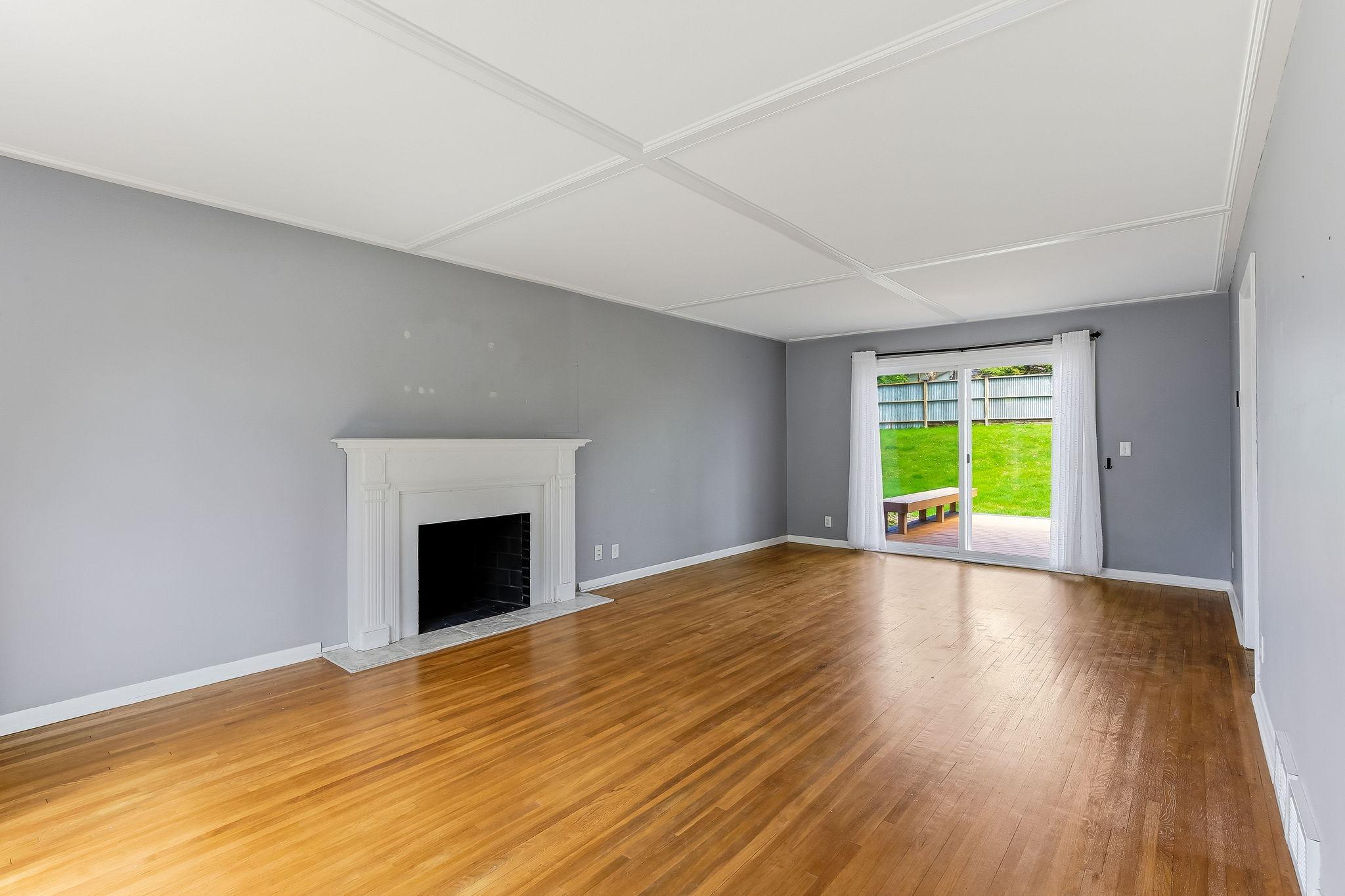 Living room to sliding glass door to deck